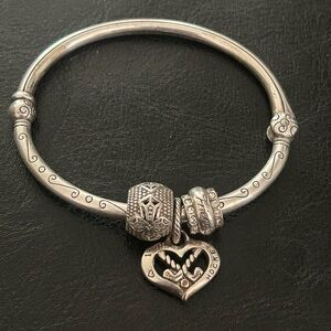 Brighton pandora style charm bracelet. Silver plate, magnetic closure, 3 charms.